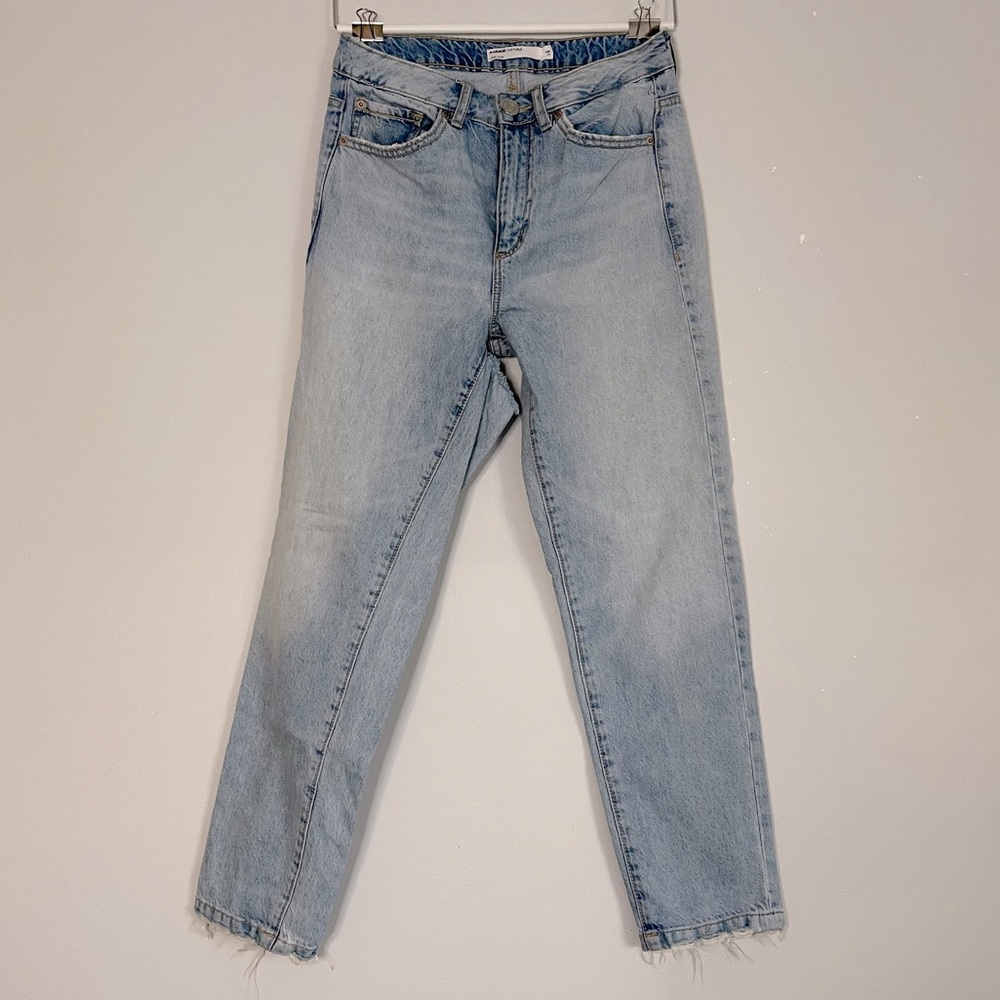Mom jeans with rip on back thigh